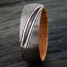 Load image into Gallery viewer, Men&#39;s Black Damascus Steel Wedding Band with Whiskey Barrel Wood Sleeve - Rings for Men and Women
