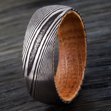 Load image into Gallery viewer, Men&#39;s Black Damascus Steel Wedding Band with Whiskey Barrel Wood Sleeve - Rings for Men and Women
