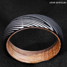 Load image into Gallery viewer, Tungsten Rings for Men Wedding Bands for Him Womens Wedding Bands for Her 6mm Black Damascus Steel with Whiskey Barrel Wood Sleeve Ring - Jewelry Store by Erik Rayo
